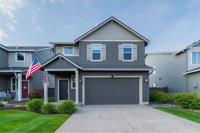 8720 N 3rd Way, Ridgefield, WA 98642 - view of front of property with a garage and concrete driveway