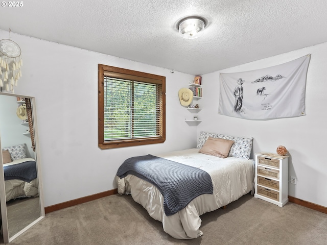 54934 E Kirkwood Dr, Sandy, OR 97055 - carpeted bedroom featuring a textured ceiling and baseboards