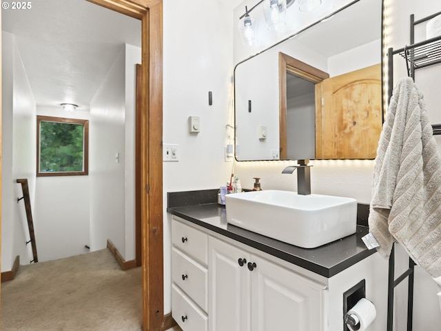 54934 E Kirkwood Dr, Sandy, OR 97055 - bathroom with vanity and baseboards