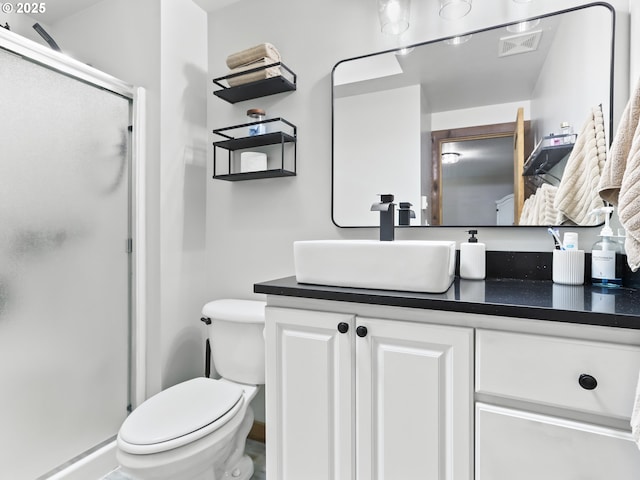 54934 E Kirkwood Dr, Sandy, OR 97055 - bathroom with vanity, a stall shower, and toilet