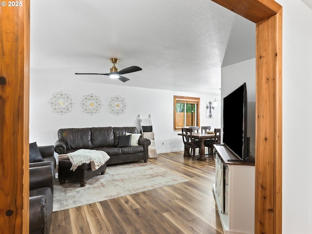 54934 E Kirkwood Dr, Sandy, OR 97055 - living room featuring wood finished floors, ceiling fan, and baseboards