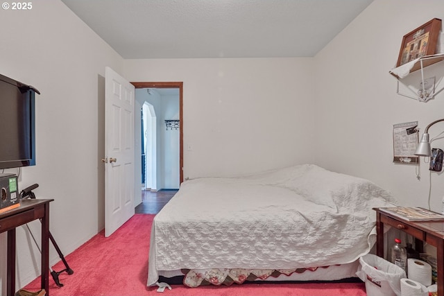 bedroom featuring carpet