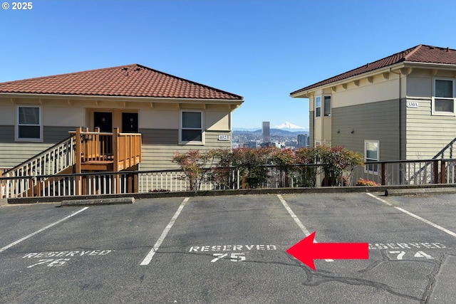 uncovered parking lot with a mountain view