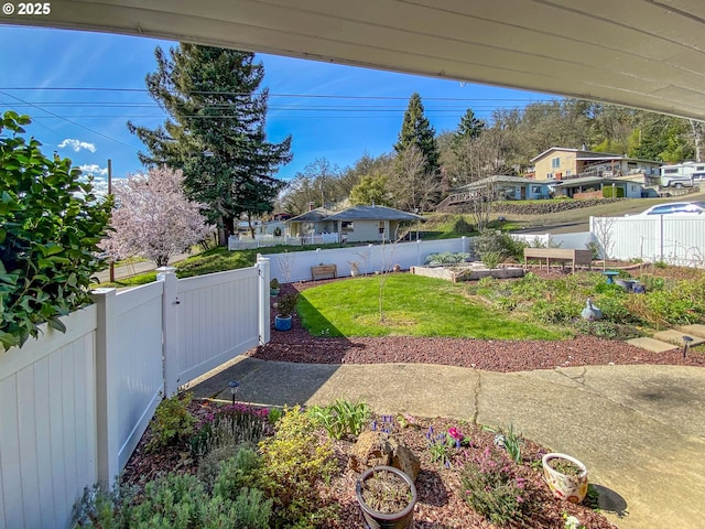 view of yard featuring a fenced backyard