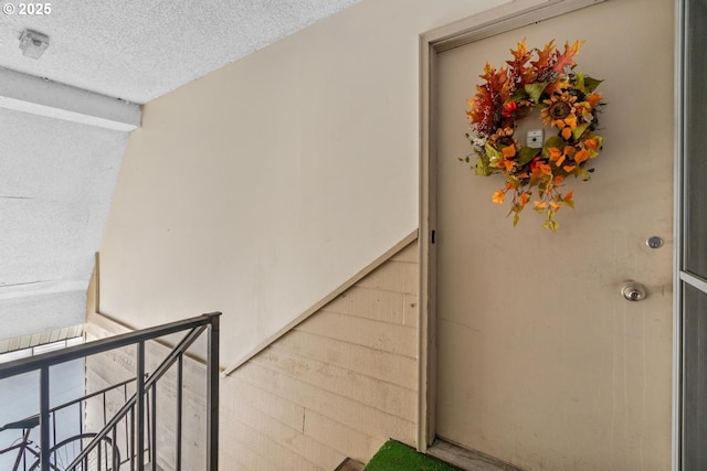 property entrance with a balcony