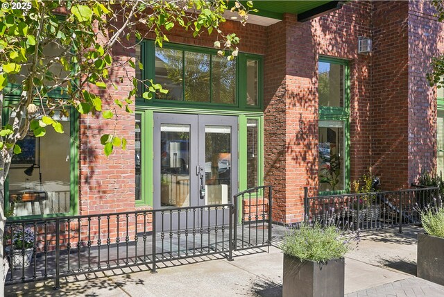 109 SW Gibbs St, Portland, OR 97239 - entrance to property with french doors and brick siding