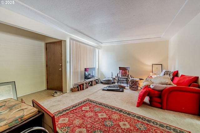 9023 SE Ankeny St, Portland, OR 97216 - living room featuring carpet floors and a textured ceiling