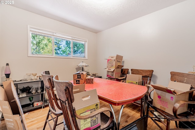 9023 SE Ankeny St, Portland, OR 97216 - home office with light wood-style flooring