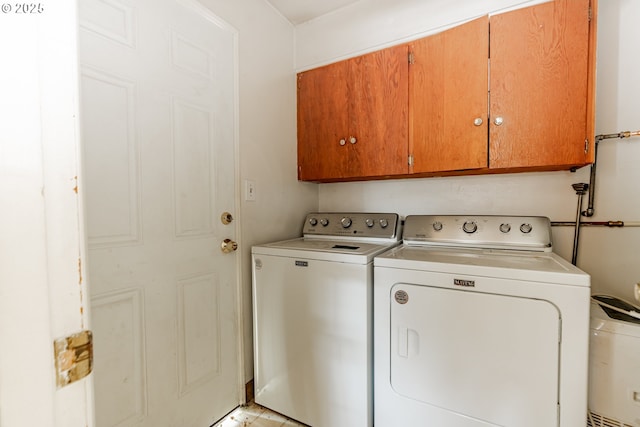 9023 SE Ankeny St, Portland, OR 97216 - washroom with cabinet space and washing machine and clothes dryer
