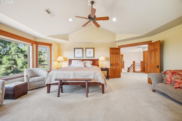 carpeted bedroom featuring ceiling fan and lofted ceiling