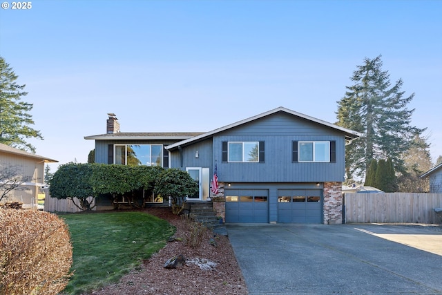 bi-level home featuring a garage