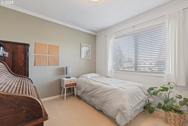 bedroom featuring ornamental molding, light colored carpet, and a textured ceiling