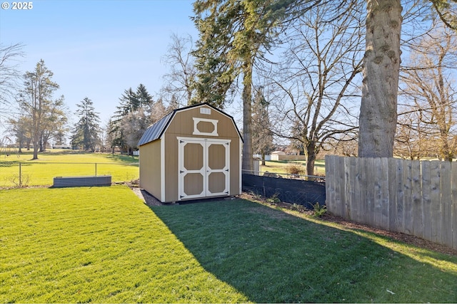 view of outbuilding featuring a yard