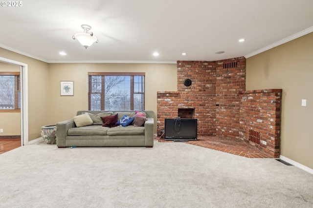 carpeted living room featuring ornamental molding