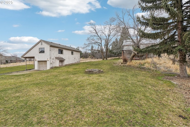 view of yard featuring a garage