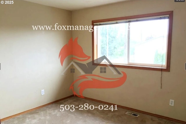 14818 NE Fremont St, Portland, OR 97230 - bedroom with multiple windows and carpet flooring