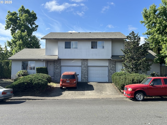 14818 NE Fremont St, Portland, OR 97230 - view of front facade featuring asphalt driveway, an attached garage, brick siding, and roof with shingles