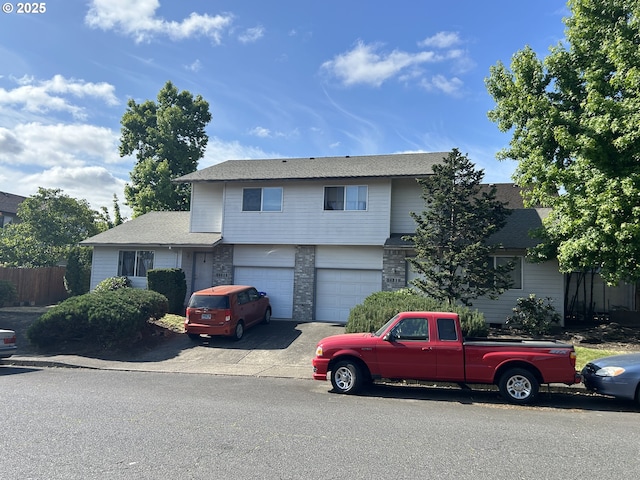 14818 NE Fremont St, Portland, OR 97230 - view of front of house with an attached garage, driveway, and a shingled roof