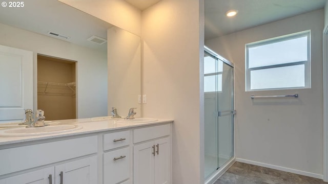 274 Greencrest St, Salem, OR 97301 - bathroom with a stall shower, double vanity, and a walk in closet