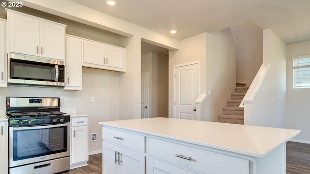 274 Greencrest St, Salem, OR 97301 - kitchen featuring stainless steel appliances, dark wood-type flooring, white cabinetry, light countertops, and recessed lighting