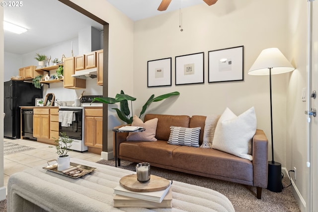 tiled living room featuring ceiling fan