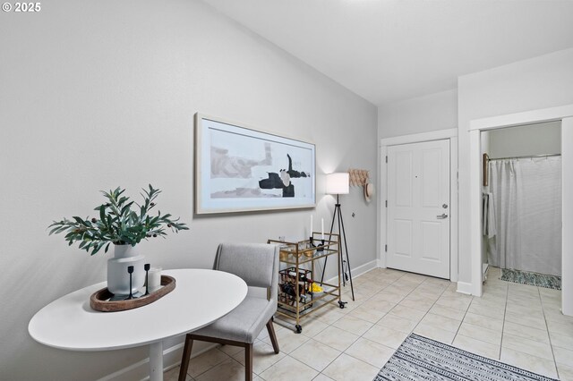 hallway with light tile patterned flooring