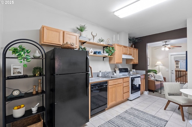 kitchen with light brown cabinetry, sink, light tile patterned floors, ceiling fan, and black appliances