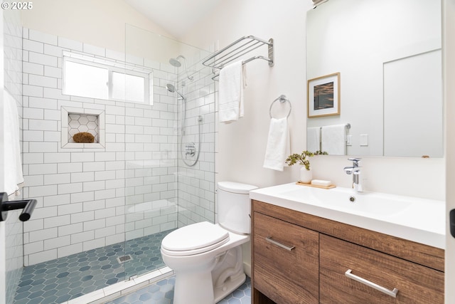 8160 SW 41st Ave, Portland, OR 97219 - bathroom with vanity, a tile shower, vaulted ceiling, and tile patterned floors