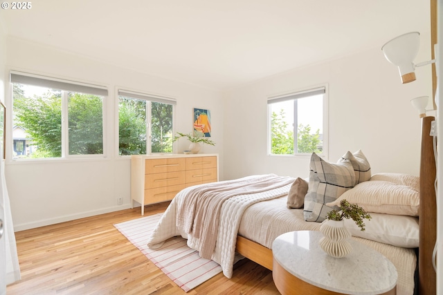 8160 SW 41st Ave, Portland, OR 97219 - bedroom featuring light wood-style flooring and baseboards
