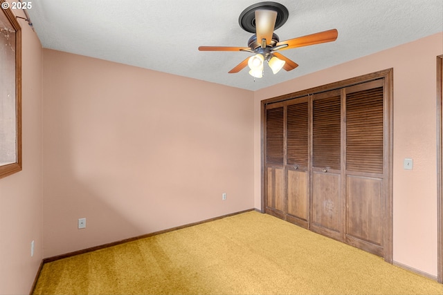 15648 NE Rose Pkwy, Portland, OR 97230 - unfurnished bedroom with carpet floors, a closet, and a ceiling fan