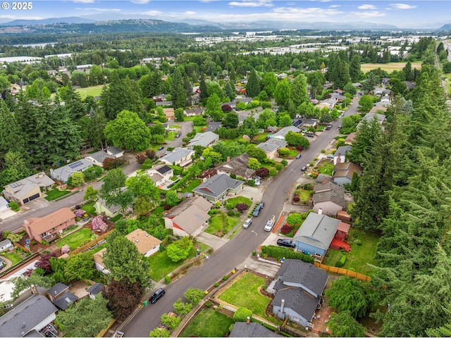 15648 NE Rose Pkwy, Portland, OR 97230 - aerial view of property and surrounding area with nearby suburban area and a mountain backdrop