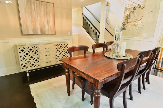 3225 SE Lincoln St, Portland, OR 97214 - dining area featuring a decorative wall, wainscoting, and stairway