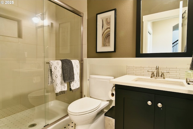 3225 SE Lincoln St, Portland, OR 97214 - full bath featuring toilet, vanity, a stall shower, and backsplash