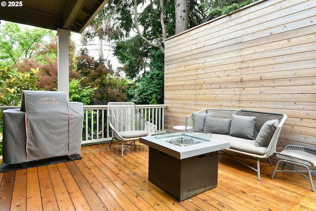 3225 SE Lincoln St, Portland, OR 97214 - wooden deck with an outdoor living space with a fire pit