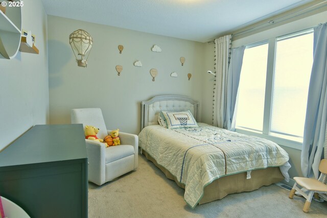 3225 SE Lincoln St, Portland, OR 97214 - bedroom featuring light carpet