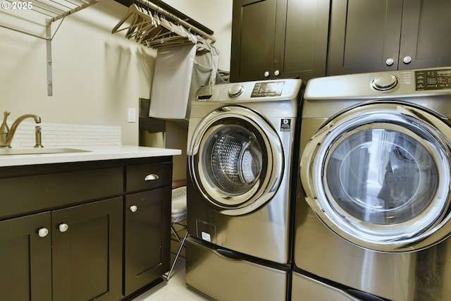 3225 SE Lincoln St, Portland, OR 97214 - laundry room with washer and dryer and cabinet space