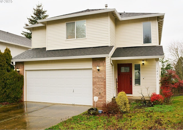 view of front property with a garage