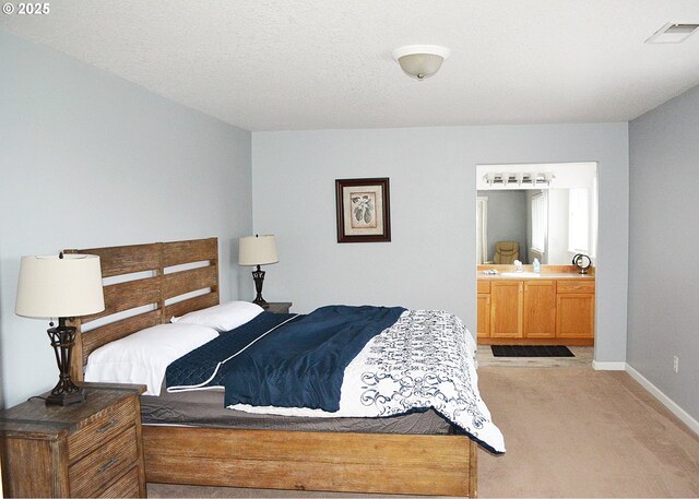 bedroom featuring a textured ceiling, hardwood / wood-style flooring, and a closet