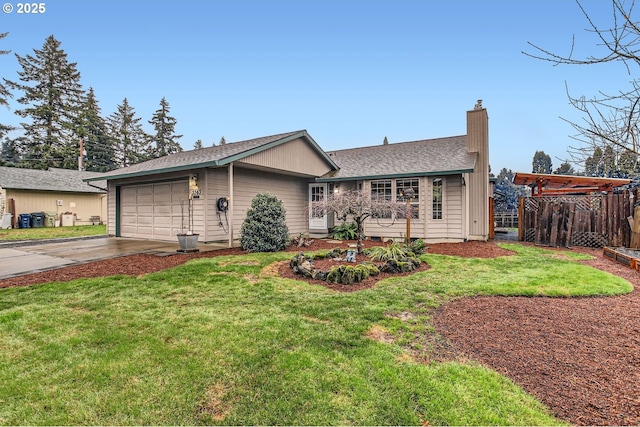 ranch-style house with a garage, fence, concrete driveway, a front lawn, and a chimney