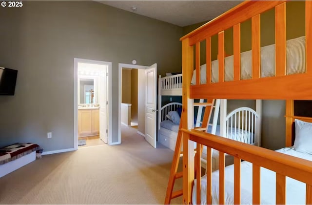 carpeted bedroom with baseboards