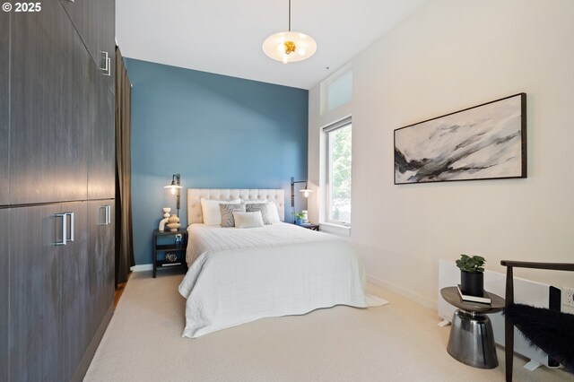 1455 N Killingsworth St Unit 201, Portland, OR 97217 - carpeted bedroom featuring baseboards