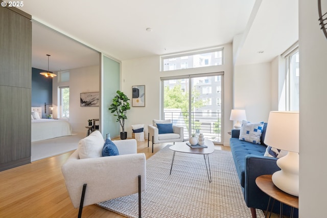 1455 N Killingsworth St Unit 201, Portland, OR 97217 - living area with wood finished floors