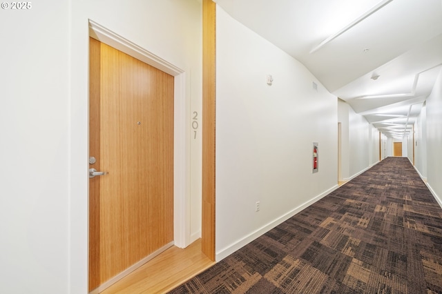 1455 N Killingsworth St Unit 201, Portland, OR 97217 - corridor with carpet and lofted ceiling
