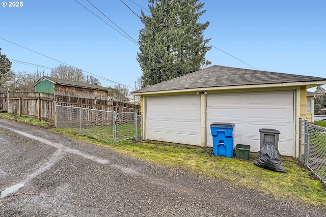 detached garage with fence