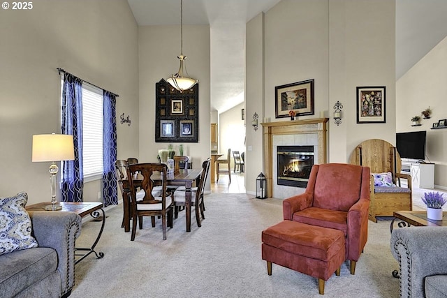 1922 Kapela Ct, Sutherlin, OR 97479 - living room featuring carpet flooring, a high ceiling, and a fireplace