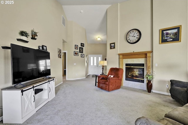 1922 Kapela Ct, Sutherlin, OR 97479 - living area featuring a towering ceiling, carpet floors, baseboards, and a fireplace