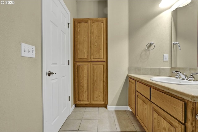 1922 Kapela Ct, Sutherlin, OR 97479 - bathroom featuring tile patterned flooring, vanity, and baseboards