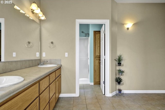 1922 Kapela Ct, Sutherlin, OR 97479 - full bathroom featuring tile patterned floors, baseboards, and double vanity
