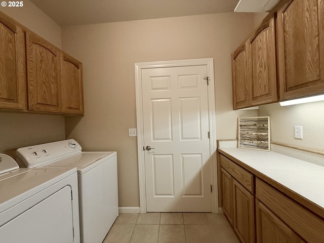 1922 Kapela Ct, Sutherlin, OR 97479 - laundry room with cabinet space, independent washer and dryer, and light tile patterned floors
