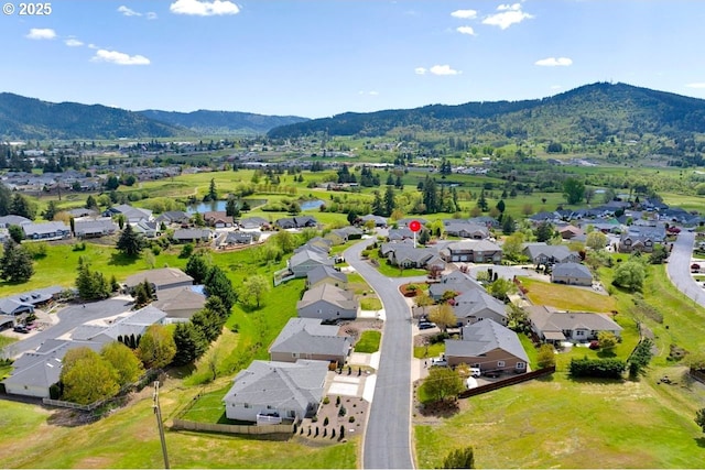 1922 Kapela Ct, Sutherlin, OR 97479 - aerial view of residential area featuring a mountain backdrop
